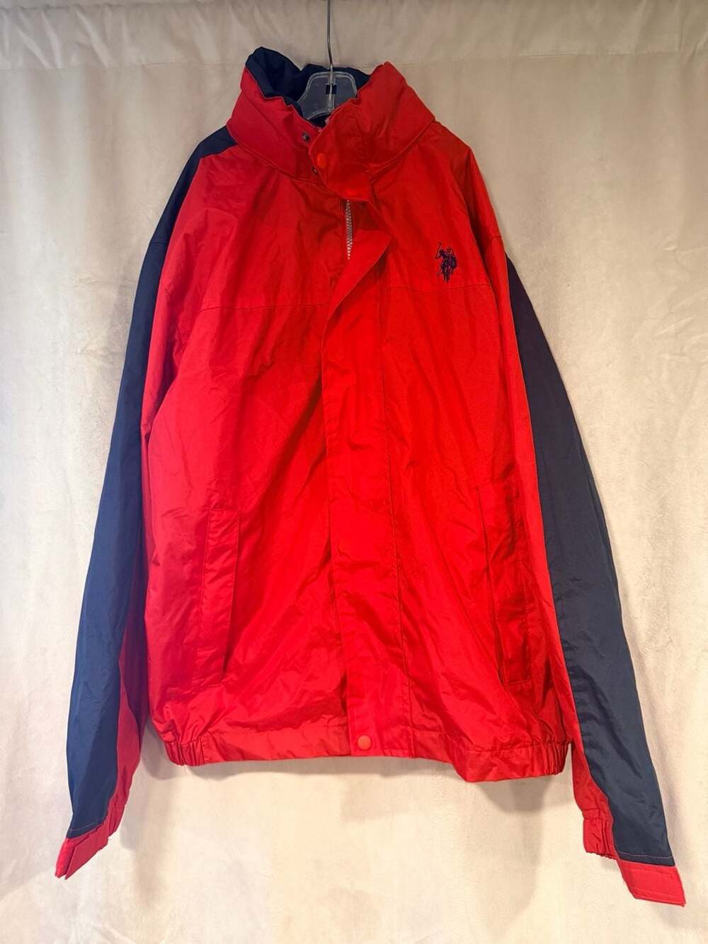 U.S. Polo Assn. Men's Red and Navy Colorblock Lightweight Windbreaker Jacket